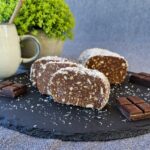 Biscuit Salami slices served on a plate with tea