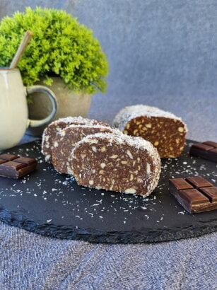 Biscuit Salami slices served on a plate with tea