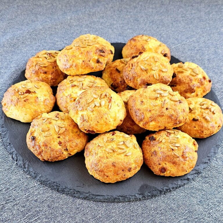 Plate of Bacon Biscuits with melted cheese and bacon bits