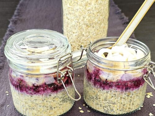 A bowl of creamy Blueberry Porridge topped with fresh blueberries and chia seeds